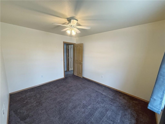 5 Arrowhead Ln, Clarksville, AR 72830 - unfurnished room with a ceiling fan, dark colored carpet, and baseboards