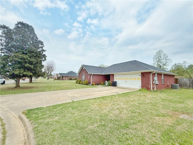 5 Arrowhead Ln, Clarksville, AR 72830 - view of front of house featuring central AC, concrete driveway, a garage, and brick siding