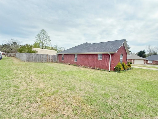 5 Arrowhead Ln, Clarksville, AR 72830 - view of side of home with brick siding and roof with shingles