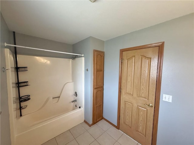 5 Arrowhead Ln, Clarksville, AR 72830 - bathroom with bathtub / shower combination, tile patterned floors, and baseboards