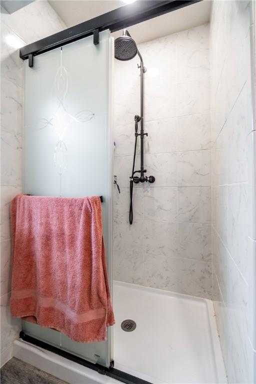 bathroom with a stall shower