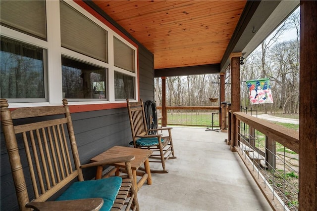 view of patio featuring a porch