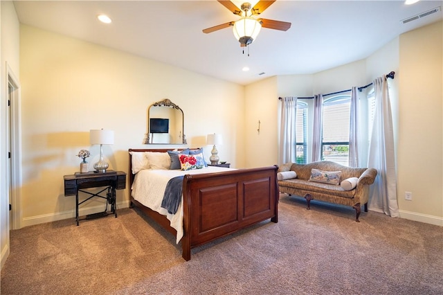 bedroom featuring a ceiling fan, visible vents, baseboards, light colored carpet, and recessed lighting