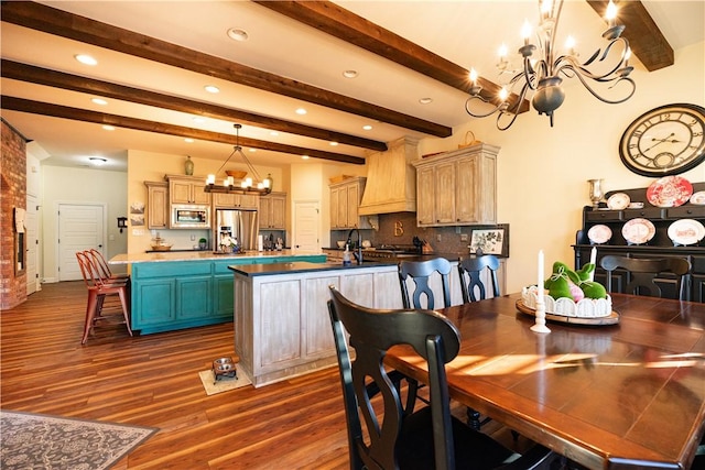 dining space featuring an inviting chandelier, beamed ceiling, dark wood-type flooring, and recessed lighting