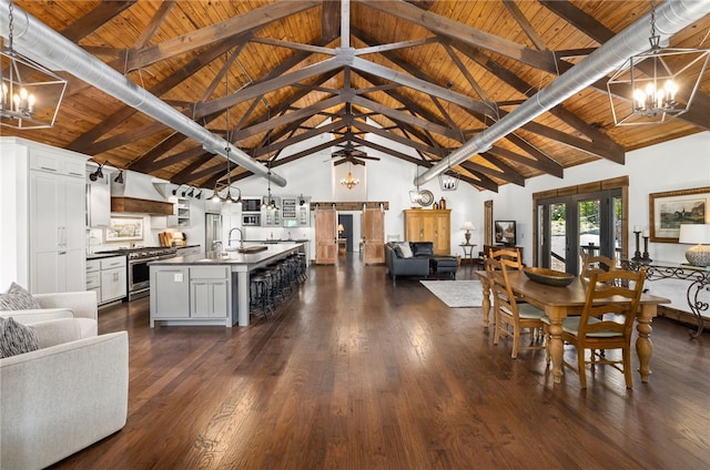 617 N Fallin Ave, Fayetteville, AR 72701 - dining area with dark wood-style flooring, high vaulted ceiling, a chandelier, beam ceiling, and wood ceiling