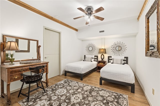 617 N Fallin Ave, Fayetteville, AR 72701 - bedroom featuring wood finished floors, baseboards, ceiling fan, and visible vents