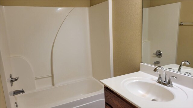 3210 S 3rd St, Rogers, AR 72758 - bathroom with vanity and shower / bath combination