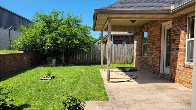 3210 S 3rd St, Rogers, AR 72758 - fenced backyard featuring a patio