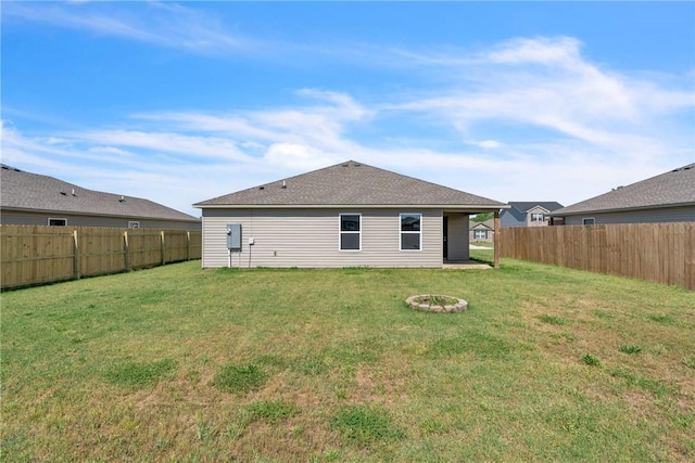 1405 Corsac St, Siloam Springs, AR 72761 - back of house featuring an outdoor fire pit