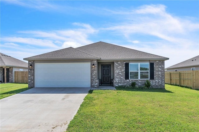 1405 Corsac St, Siloam Springs, AR 72761 - view of front facade with driveway, a garage, brick siding, and roof with shingles