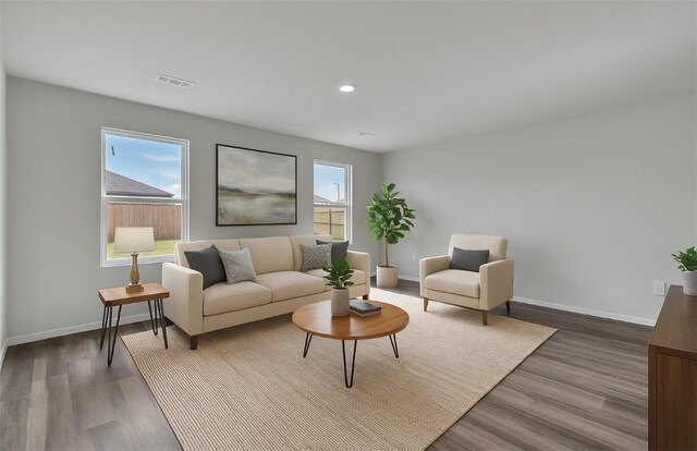 1405 Corsac St, Siloam Springs, AR 72761 - living area with wood finished floors, baseboards, and recessed lighting