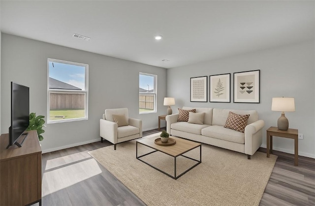 1405 Corsac St, Siloam Springs, AR 72761 - living area with wood finished floors, baseboards, and recessed lighting