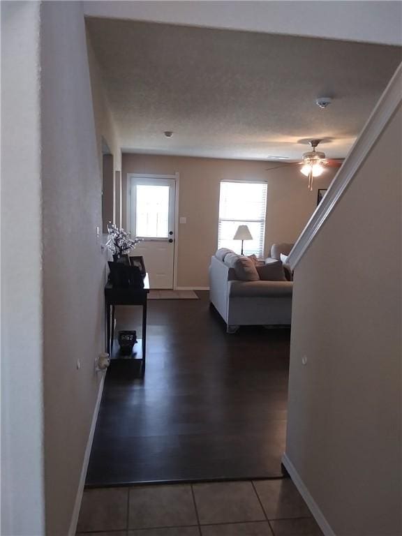 6527 Huntington Ct, Fort Smith, AR 72916 - hall with a wealth of natural light, baseboards, and tile patterned floors