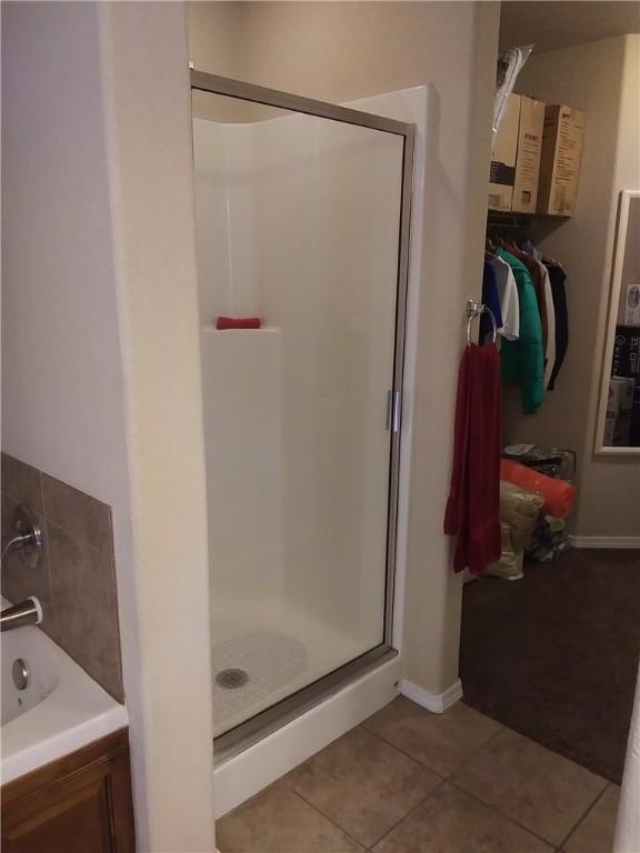 6527 Huntington Ct, Fort Smith, AR 72916 - full bath with a tub, tile patterned flooring, and a shower stall