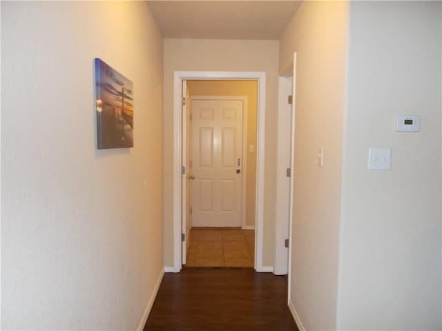 6527 Huntington Ct, Fort Smith, AR 72916 - hallway with baseboards and dark wood-style floors