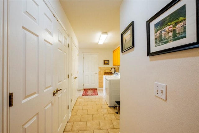 44 Devizis Dr, Bella Vista, AR 72714 - hall with light tile patterned floors and washer and dryer