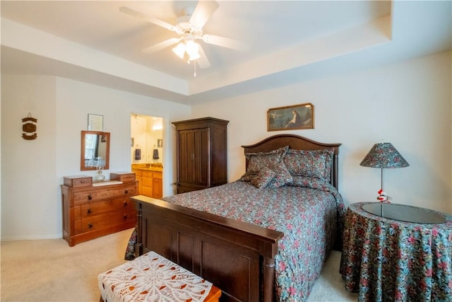 44 Devizis Dr, Bella Vista, AR 72714 - bedroom featuring light carpet, a raised ceiling, baseboards, and a ceiling fan