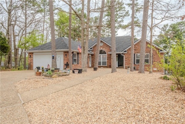 44 Devizis Dr, Bella Vista, AR 72714 - single story home with driveway, brick siding, roof with shingles, and an attached garage