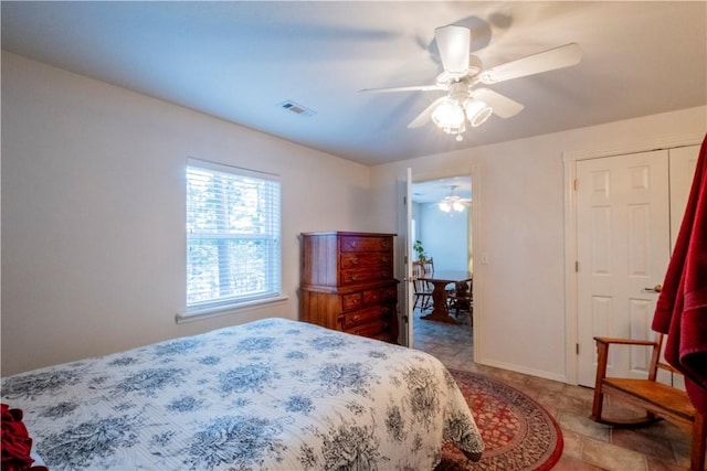 44 Devizis Dr, Bella Vista, AR 72714 - bedroom with a ceiling fan and baseboards