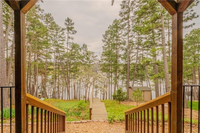 44 Devizis Dr, Bella Vista, AR 72714 - view of yard featuring a storage shed
