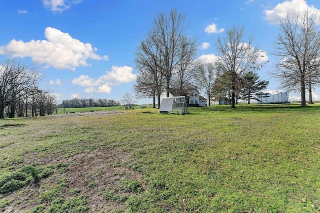 188 Lonestar Rd, Anderson, MO 64831 - view of grassy yard with an exterior structure and an outdoor structure