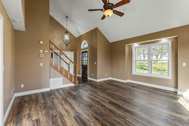 188 Lonestar Rd, Anderson, MO 64831 - unfurnished living room with stairway, dark wood-style floors, high vaulted ceiling, baseboards, and ceiling fan