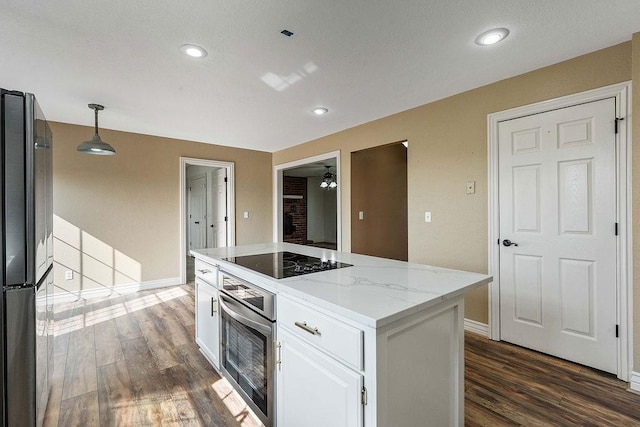 188 Lonestar Rd, Anderson, MO 64831 - kitchen featuring black appliances, white cabinetry, dark wood-style flooring, a ceiling fan, and a kitchen island
