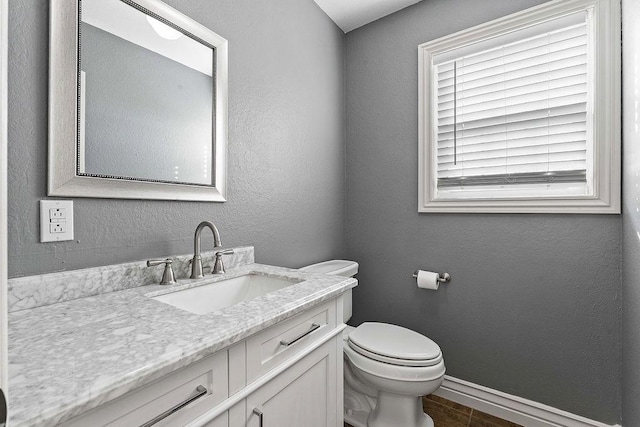 188 Lonestar Rd, Anderson, MO 64831 - half bath featuring vanity, toilet, and baseboards