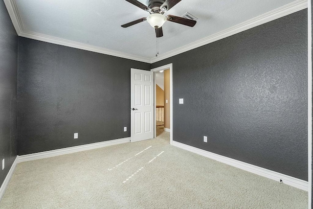 188 Lonestar Rd, Anderson, MO 64831 - carpeted empty room featuring a ceiling fan, baseboards, and crown molding