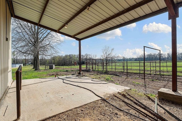 188 Lonestar Rd, Anderson, MO 64831 - view of yard with a rural view, an outdoor structure, and a patio area