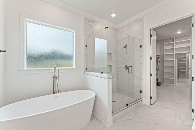 bathroom featuring a shower stall, a walk in closet, marble finish floor, and ornamental molding