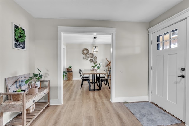 17225 Featherstone Trl, Gentry, AR 72734 - entryway featuring baseboards and light wood-style flooring