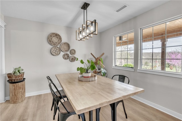 17225 Featherstone Trl, Gentry, AR 72734 - dining room with light wood-style floors, baseboards, and visible vents