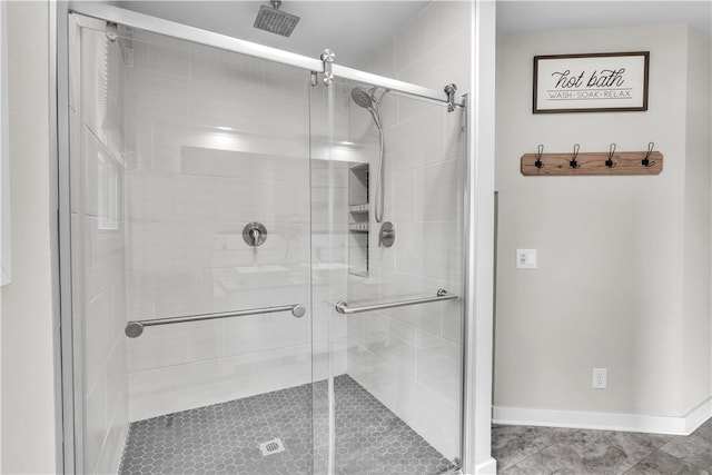17225 Featherstone Trl, Gentry, AR 72734 - bathroom with a shower stall, baseboards, and tile patterned flooring