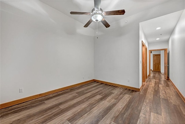 321 E Lafayette St Unit 103, Fayetteville, AR 72701 - unfurnished room with wood finished floors, baseboards, ceiling fan, and recessed lighting