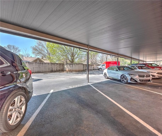 321 E Lafayette St Unit 103, Fayetteville, AR 72701 - covered parking lot featuring fence