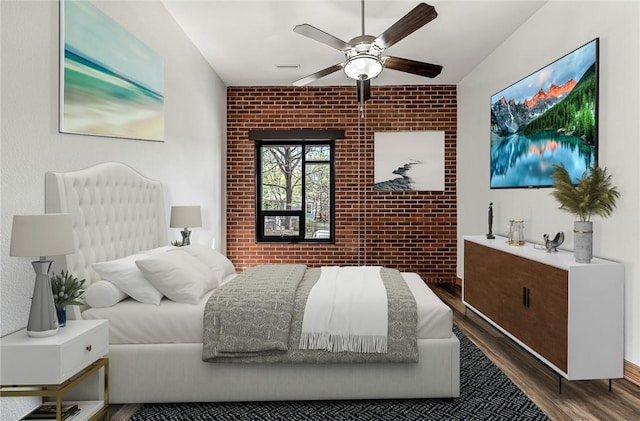 321 E Lafayette St Unit 103, Fayetteville, AR 72701 - bedroom featuring wood finished floors, brick wall, and ceiling fan