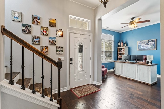 6628 Bernice Ave, Springdale, AR 72762 - foyer entrance featuring ornamental molding, dark wood finished floors, ceiling fan, baseboards, and stairs