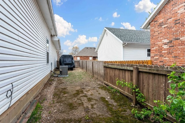 6628 Bernice Ave, Springdale, AR 72762 - fenced backyard featuring cooling unit