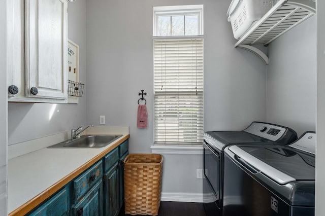 6628 Bernice Ave, Springdale, AR 72762 - laundry room featuring washing machine and clothes dryer, cabinet space, and baseboards
