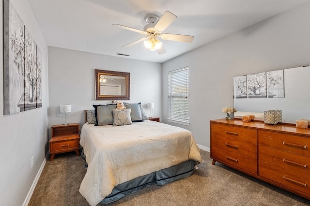 6628 Bernice Ave, Springdale, AR 72762 - bedroom with dark colored carpet, baseboards, and ceiling fan