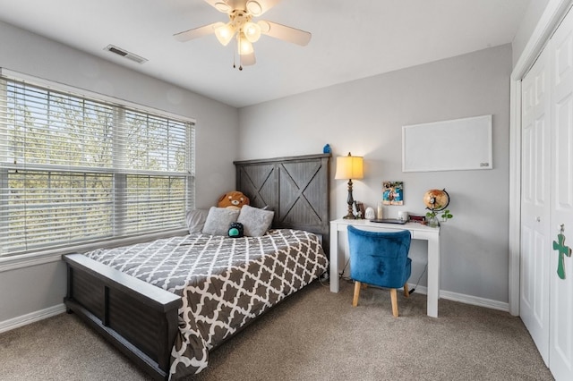 6628 Bernice Ave, Springdale, AR 72762 - carpeted bedroom featuring baseboards, a closet, and a ceiling fan