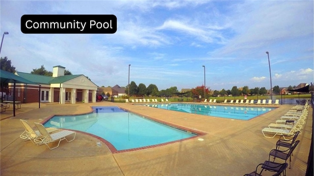 6628 Bernice Ave, Springdale, AR 72762 - community pool featuring a patio
