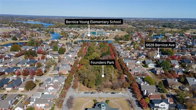 6628 Bernice Ave, Springdale, AR 72762 - aerial view of property and surrounding area with a large body of water and nearby suburban area