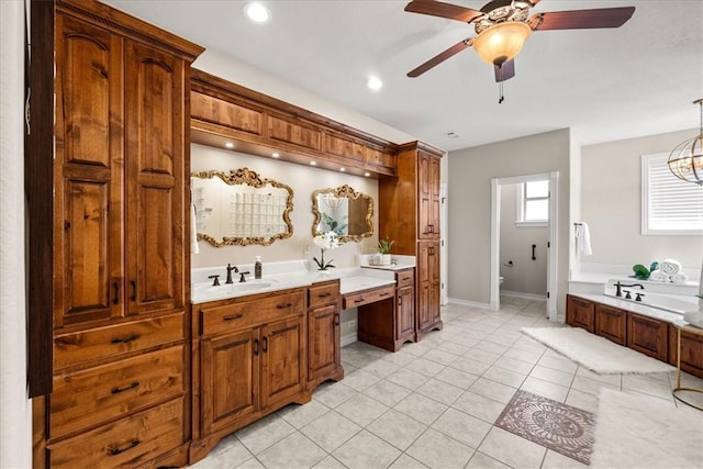 17793 Bluffview Dr, Springdale, AR 72764 - full bath featuring a ceiling fan, a bath, vanity, tile patterned flooring, and a chandelier