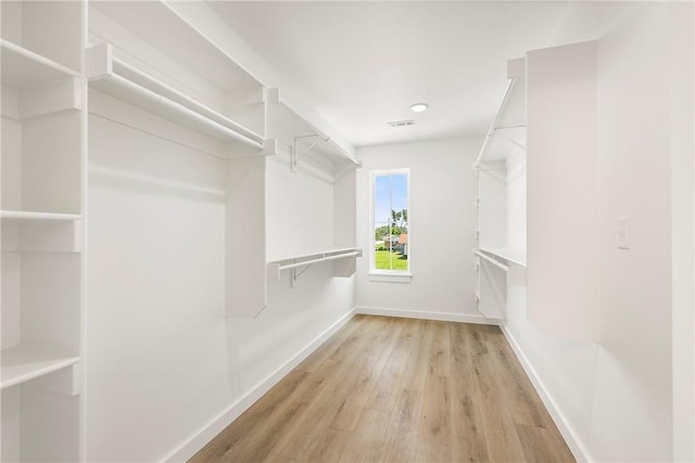 730 N 5th St, Rogers, AR 72756 - walk in closet with wood finished floors