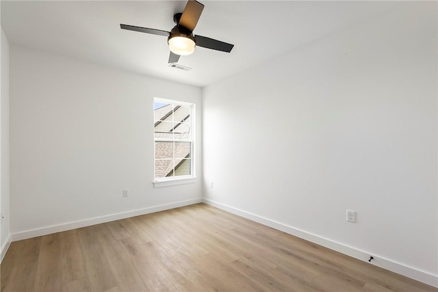 730 N 5th St, Rogers, AR 72756 - empty room featuring light wood-style flooring and a ceiling fan