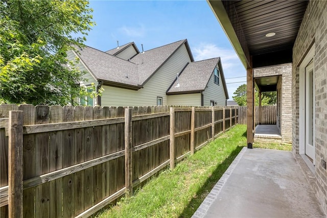 730 N 5th St, Rogers, AR 72756 - fenced backyard with a patio
