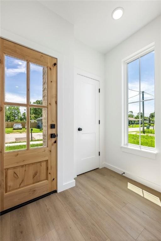 730 N 5th St, Rogers, AR 72756 - entrance foyer with light wood-style floors and baseboards