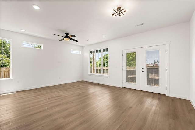 730 N 5th St, Rogers, AR 72756 - unfurnished room with french doors, wood finished floors, a ceiling fan, and recessed lighting